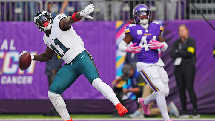 Oct 19, 2025; Minneapolis, Minnesota, USA; Philadelphia Eagles wide receiver A.J. Brown (11) catches a pass for a touchdown during the first half against the Minnesota Vikings at U.S. Bank Stadium. Mandatory Credit: Brad Rempel-Imagn Images