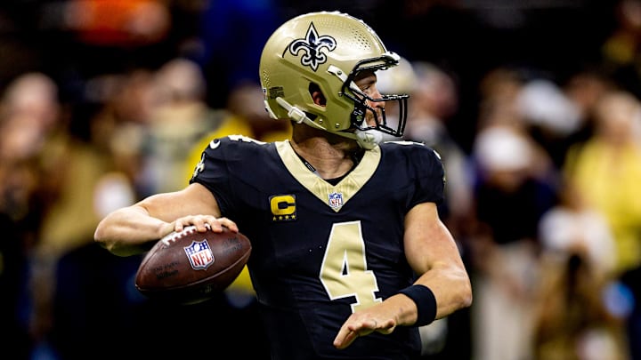 Nov 17, 2024; New Orleans, Louisiana, USA;  New Orleans Saints quarterback Derek Carr (4) during warmups before the game against the Cleveland Browns at Caesars Superdome. Mandatory Credit: Stephen Lew-Imagn Images