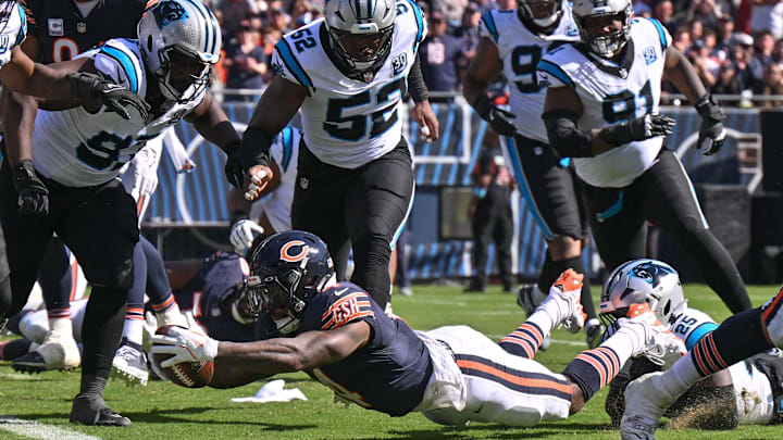 D'Andre Swift dives towards the goal line against the Carolina Panthers in a 2024 Bears win.