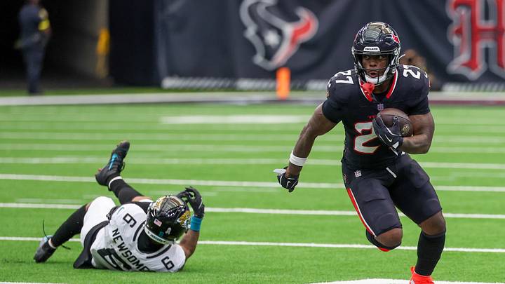 Nov 9, 2025; Houston, Texas, USA; Houston Texans running back Woody Marks (27) runs pastJacksonville Jaguars cornerback Greg Newsome II (6) during the second half at NRG Stadium. Mandatory Credit: Thomas Shea-Imagn Images Nov 9, 2025; Houston, Texas, USA; Houston Texans running back Woody Marks (27) runs pastJacksonville Jaguars cornerback Greg Newsome II (6) during the second half at NRG Stadium. Mandatory Credit: Thomas Shea-Imagn Images