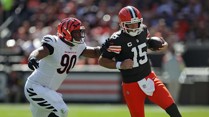 Cleveland Browns quarterback Joe Flacco (15) is chased out of bounds by Cincinnati Bengals defensive tackle Kris Jenkins Jr. (90) during the second half of an NFL football game at Huntington Bank Field, Sept. 7, 2025, in Cleveland, Ohio.
