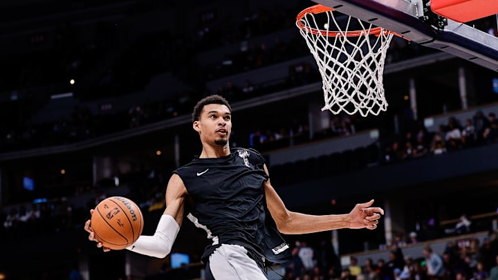 Apr 2, 2024; Denver, Colorado, USA; San Antonio Spurs center Victor Wembanyama (1) warms up before