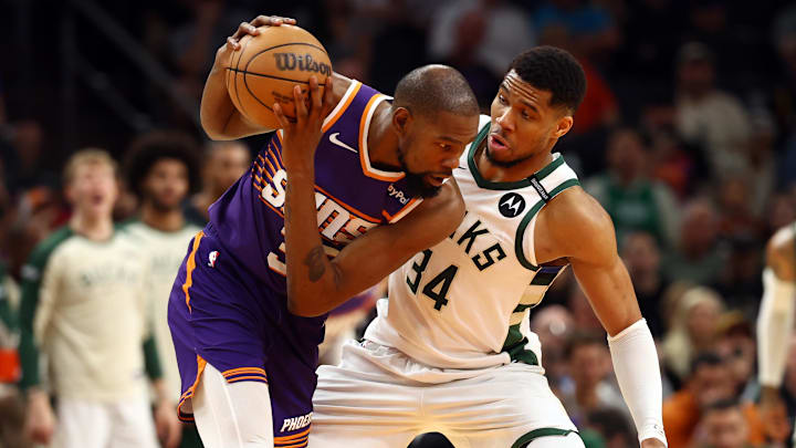 Mar 24, 2025; Phoenix, Arizona, USA; Milwaukee Bucks forward Giannis Antetokounmpo (34) defends against Phoenix Suns forward Kevin Durant (35) at Footprint Center. Mandatory Credit: Mark J. Rebilas-Imagn Images Mar 24, 2025; Phoenix, Arizona, USA; Milwaukee Bucks forward Giannis Antetokounmpo (34) defends against Phoenix Suns forward Kevin Durant (35) at Footprint Center. Mandatory Credit: Mark J. Rebilas-Imagn Images