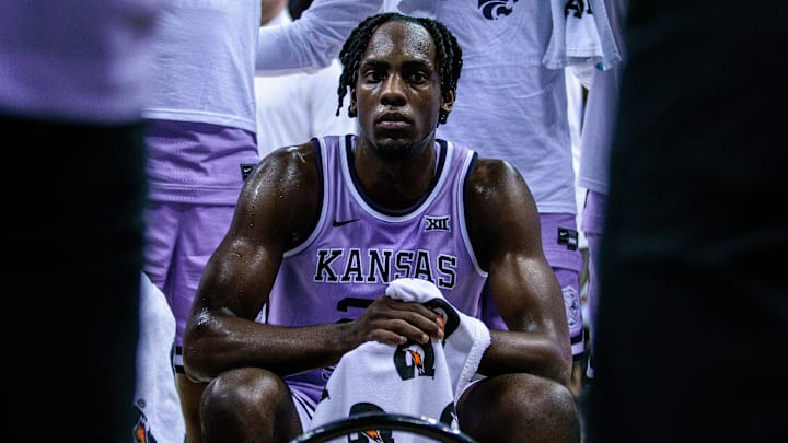 Mar 13, 2024; Kansas City, MO, USA; Kansas State Wildcats forward Arthur Kaluma (24) in the huddle during a timeout in the first half against the Texas Longhorns at T-Mobile Center. Mandatory Credit: William Purnell-USA TODAY Sports