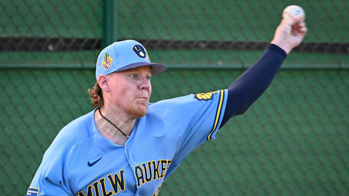 Milwaukee Brewers pitcher Rob Zastryzny (58) throws in the outfield during spring training workouts Saturday, February 14, 2026, at American Family Fields of Phoenix in Phoenix, Arizona. Milwaukee Brewers pitcher Rob Zastryzny (58) throws in the outfield during spring training workouts Saturday, February 14, 2026, at American Family Fields of Phoenix in Phoenix, Arizona.