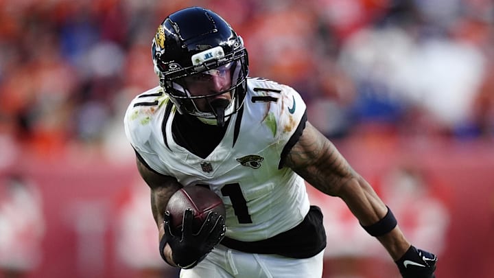 Jacksonville Jaguars wide receiver Parker Washington (11) makes a catch against the Denver Broncos during the second half at Empower Field at Mile High. 