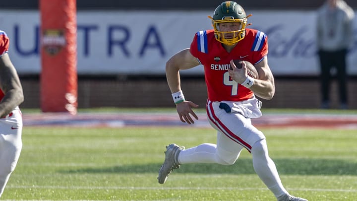 Jan 31, 2026; Mobile, AL, USA;  National quarterback Cole Payton (9) of North Dakota State runs the ball during the first half of the 2026 Senior Bowl at University of South Alabama, Hancock Whitney Stadium. Mandatory Credit: Vasha Hunt-Imagn Images