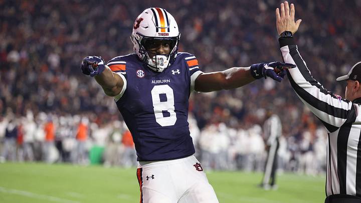 Texas Longhorns wide receiver Cam Coleman celebrates after scoring a touchdown as a member of the Auburn Tigers against the Texas A&M Aggies Texas Longhorns wide receiver Cam Coleman celebrates after scoring a touchdown as a member of the Auburn Tigers against the Texas A&M Aggies