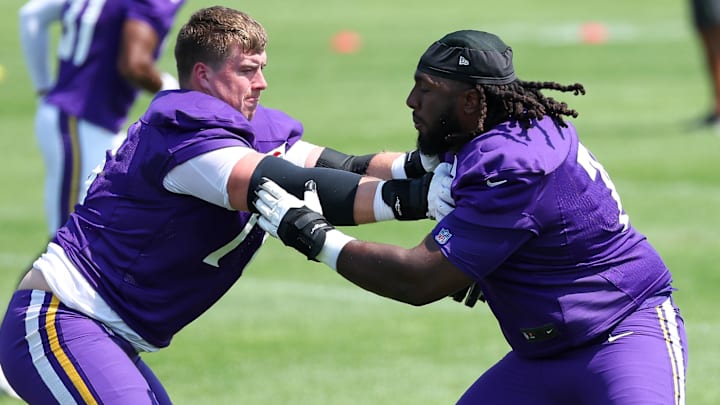 Jul 29, 2025; Eagan, MN, USA; Minnesota Vikings guard Donovan Jackson (74) and Minnesota Vikings guard Will Fries (76) takes part in drills during the teams training camp at the Minnesota Vikings Training Facility. 