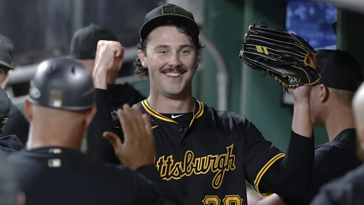 Sep 9, 2024; Pittsburgh, Pennsylvania, USA;  Pittsburgh Pirates starting pitcher Paul Skenes (30) reacts in the dugout after pitching the sixth inning against the Miami Marlins at PNC Park. Mandatory Credit: Charles LeClaire-Imagn Images