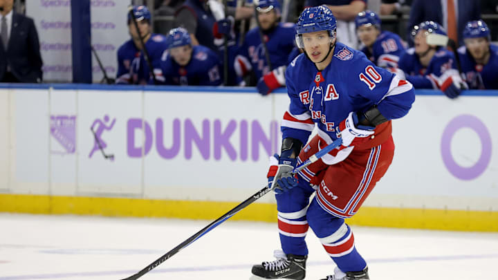Jan 5, 2026; New York, New York, USA; New York Rangers left wing Artemi Panarin (10) skates with the puck against the Utah Mammoth during the second period at Madison Square Garden. Mandatory Credit: Brad Penner-Imagn Images