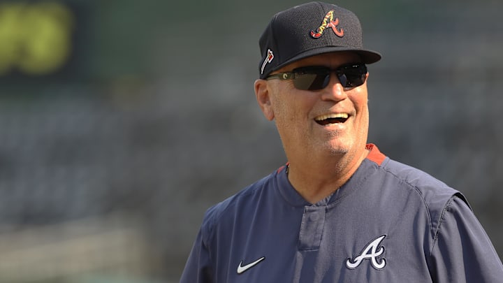 Atlanta Braves manager Brian Snitker (43) reacts during batting practice before the game against the Pittsburgh Pirates at PNC Park.