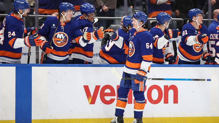 Apr 9, 2026; Elmont, New York, USA;  New York Islanders center Calum Ritchie (64) celebrates with teammates after scoring a goal in the third period against the Toronto Maple Leafs at UBS Arena. Mandatory Credit: Wendell Cruz-Imagn Images