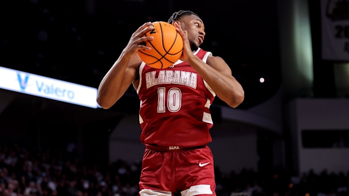 Jan 11, 2025; College Station, Texas, USA; Alabama Crimson Tide forward Mouhamed Dioubate (10) rebounds against the Texas A&M Aggies during the first half at Reed Arena. Mandatory Credit: Erik Williams-Imagn Images