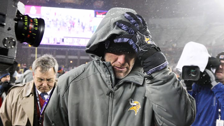 Dec 20, 2010; Minneapolis, MN, USA; Minnesota Vikings quarterback Brett Favre (4) walks off the field following the game against the Chicago Bears at TCF Bank Stadium. The Bears defeated the Vikings 40-14. Mandatory Credit: Brace Hemmelgarn-Imagn Images