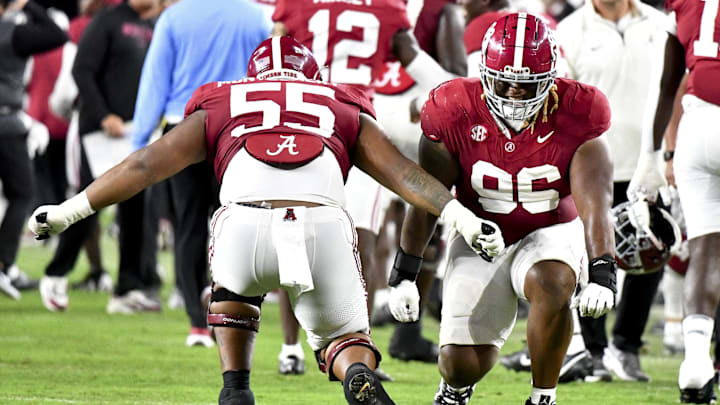 Sep 28, 2024; Tuscaloosa, Alabama, USA; Alabama Crimson Tide offensive lineman Roq Montgomery (55) and defensive lineman Tim Keenan III (96) celebrate during the first half of against the Georgia Bulldogs at Bryant-Denny Stadium Sep 28, 2024; Tuscaloosa, Alabama, USA; Alabama Crimson Tide offensive lineman Roq Montgomery (55) and defensive lineman Tim Keenan III (96) celebrate during the first half of against the Georgia Bulldogs at Bryant-Denny Stadium