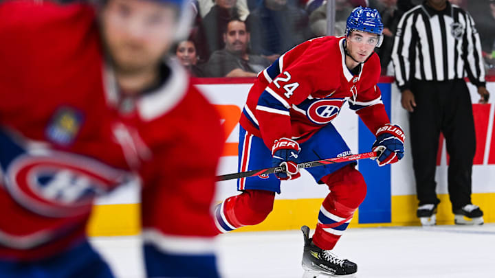 Oct 1, 2024; Montreal, Quebec, CAN; Montreal Canadiens defenseman Logan Mailloux (24) looks towards the play against the Ottawa Senators during the second period at Bell Centre. Mandatory Credit: David Kirouac-Imagn Images