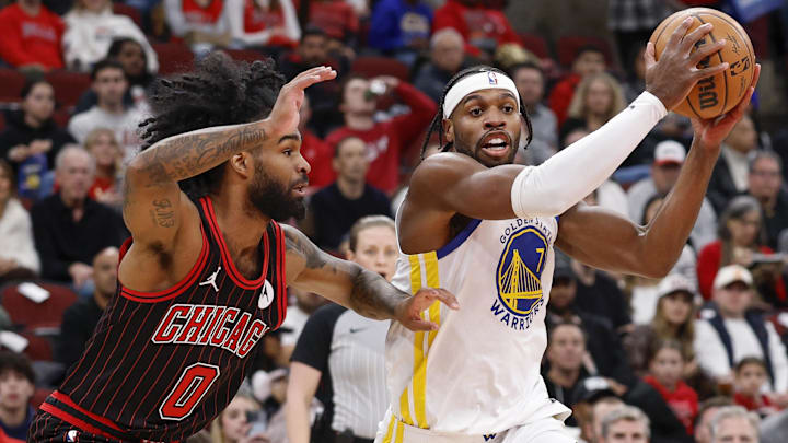 Dec 7, 2025; Chicago, Illinois, USA; Golden State Warriors guard Buddy Hield (7) drives to the basket against Chicago Bulls guard Coby White (0) during the first half at United Center. Mandatory Credit: Kamil Krzaczynski-Imagn Images Dec 7, 2025; Chicago, Illinois, USA; Golden State Warriors guard Buddy Hield (7) drives to the basket against Chicago Bulls guard Coby White (0) during the first half at United Center. Mandatory Credit: Kamil Krzaczynski-Imagn Images