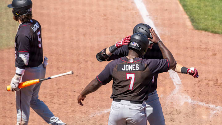 Gamecocks catcher Dalton Reeves (44) celebrates his two run homer with Gamecocks outfielder Kennedy