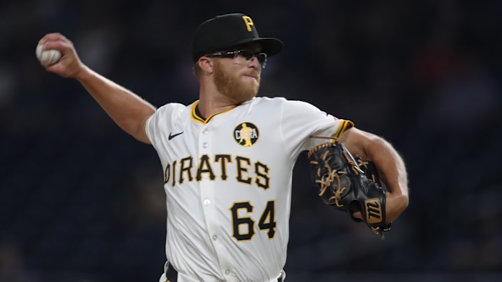 Aug 5, 2025; Pittsburgh, Pennsylvania, USA;  Pittsburgh Pirates relief pitcher Cam Sanders (64) delivers a pitch in his major league debut against the San Francisco Giants during the eighth inning at PNC Park. Mandatory Credit: Charles LeClaire-Imagn Images