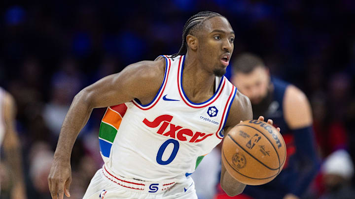 Jan 8, 2025; Philadelphia, Pennsylvania, USA; Philadelphia 76ers guard Tyrese Maxey (0) dribbles the ball against the Washington Wizards during the third quarter at Wells Fargo Center. Mandatory Credit: Bill Streicher-Imagn Images