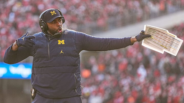 Michigan head coach Sherrone Moore celebrates after place kicker Dominic Zvada scores a field goal against Ohio State during the second half at Ohio Stadium in Columbus, Ohio on Saturday, Nov. 30, 2024.