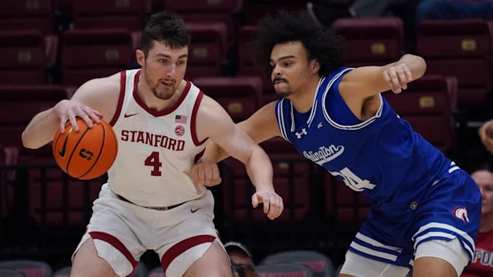 Dec 17, 2025; Stanford, California, USA; Stanford Cardinal forward AJ Rohosy (4) posts up Texas-Arlington Mavericks forward/center Cameron Jackson (34) in the first half at Maples Pavilion. Mandatory Credit: David Gonzales-Imagn Images Dec 17, 2025; Stanford, California, USA; Stanford Cardinal forward AJ Rohosy (4) posts up Texas-Arlington Mavericks forward/center Cameron Jackson (34) in the first half at Maples Pavilion. Mandatory Credit: David Gonzales-Imagn Images
