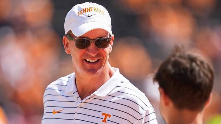 Peyton Manning smiles at a fan on the sidelines before Tennessee vs. Georgia at Neyland Stadium in Knoxville, Tennessee, on September 13, 2025. Peyton Manning smiles at a fan on the sidelines before Tennessee vs. Georgia at Neyland Stadium in Knoxville, Tennessee, on September 13, 2025.