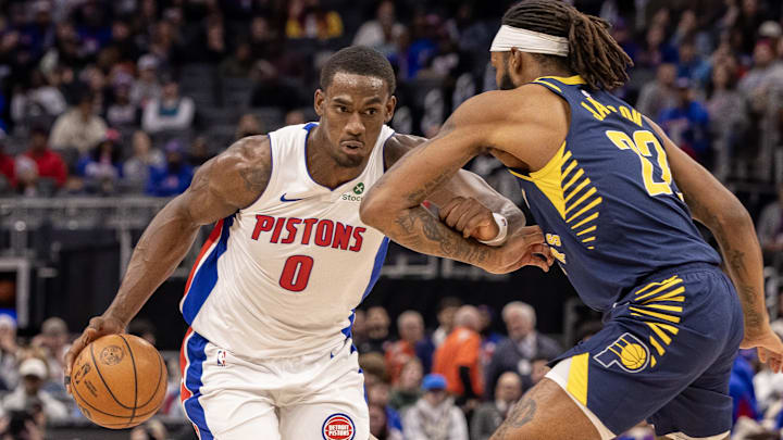 Nov 17, 2025; Detroit, Michigan, USA; Indiana Pacers forward Isaiah Jackson (22) defends against Detroit Pistons center Jalen Duren (0) during the first quarter at Little Caesars Arena. Mandatory Credit: David Reginek-Imagn Images