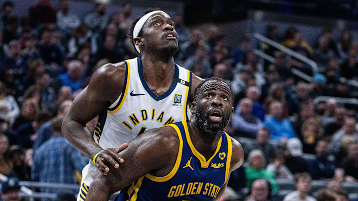 Feb 8, 2024; Indianapolis, Indiana, USA; Golden State Warriors forward Draymond Green (23) boxes out Indiana Pacers forward Pascal Siakam (43) in the second half at Gainbridge Fieldhouse. Mandatory Credit: Trevor Ruszkowski-Imagn Images