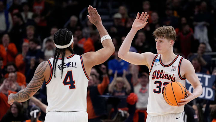 Illinois guard Kylan Boswell (4) and Illinois guard Kasparas Jakucionis (32) celebrate their victory over Xavier at the end of their first round NCAA men’ s basketball tournament game on Friday March 21, 2025 at Fiserv Forum in Milwaukee, Wis.