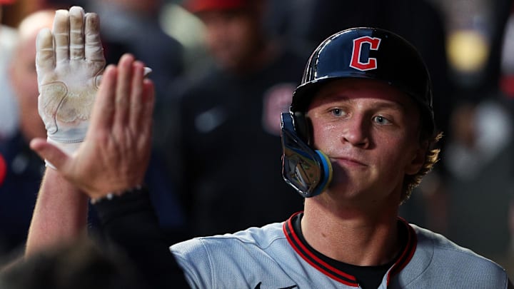 Sep 20, 2025; Minneapolis, Minnesota, USA; Cleveland Guardians center fielder Petey Halpin (0) celebrates after scoring in his Major League debut against the Minnesota Twins during the fifth inning of game two of a double header at Target Field. Mandatory Credit: Matt Krohn-Imagn Images