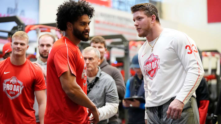 Ohio State defensive end JT Tuimoloau, left, was the No. 1 recruit in the country coming out of Eastside Catholic (WA) in 2021.