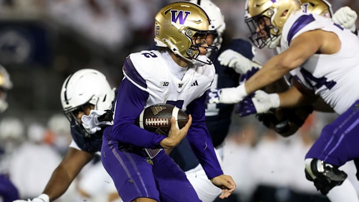 Huskies quarterback Demond Williams Jr (2) runs the ball against Penn State during the third quarter at Beaver Stadium.