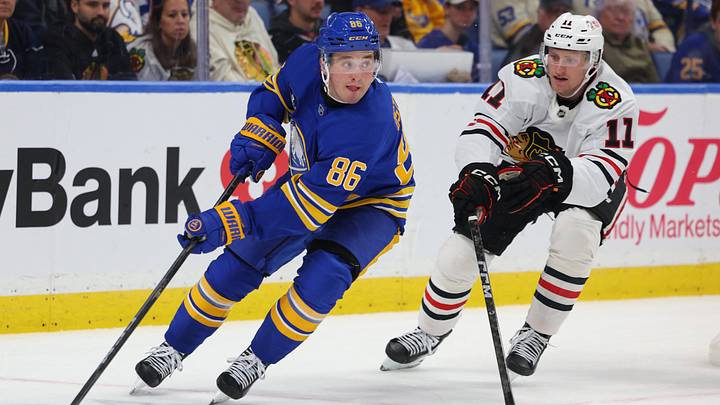 Buffalo Sabres center Noah Ostlund (86) looks to make a pass as Chicago Blackhawks center Oliver Moore (11) defends during the second period at KeyBank Center. Mandatory Credit: Timothy T. Ludwig-Imagn Images Buffalo Sabres center Noah Ostlund (86) looks to make a pass as Chicago Blackhawks center Oliver Moore (11) defends during the second period at KeyBank Center. Mandatory Credit: Timothy T. Ludwig-Imagn Images