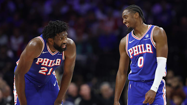 Oct 25, 2025; Philadelphia, Pennsylvania, USA; Philadelphia 76ers guard Tyrese Maxey (0) and center Joel Embiid (21) talks during a break in action in the second quarter against the Charlotte Hornets at Xfinity Mobile Arena. Mandatory Credit: Bill Streicher-Imagn Images Oct 25, 2025; Philadelphia, Pennsylvania, USA; Philadelphia 76ers guard Tyrese Maxey (0) and center Joel Embiid (21) talks during a break in action in the second quarter against the Charlotte Hornets at Xfinity Mobile Arena. Mandatory Credit: Bill Streicher-Imagn Images