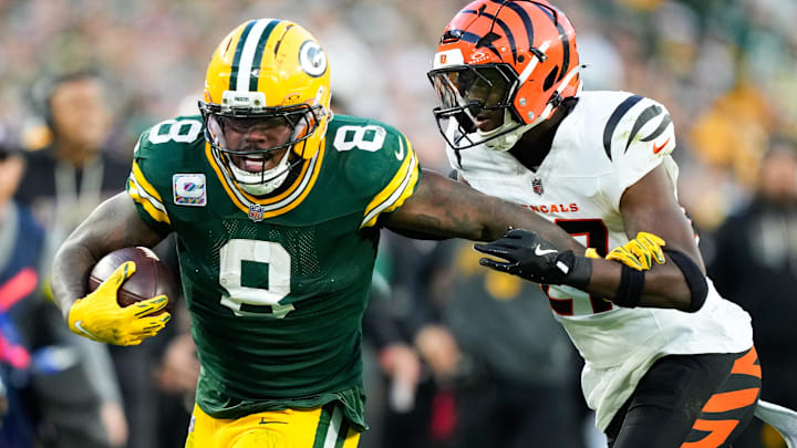 Oct 12, 2025; Green Bay, Wisconsin, USA; Green Bay Packers running back Josh Jacobs (8) runs the ball against Cincinnati Bengals safety Jordan Battle (27) in the second half at Lambeau Field. Mandatory Credit: Kayla Wolf-Imagn Images Oct 12, 2025; Green Bay, Wisconsin, USA; Green Bay Packers running back Josh Jacobs (8) runs the ball against Cincinnati Bengals safety Jordan Battle (27) in the second half at Lambeau Field. Mandatory Credit: Kayla Wolf-Imagn Images