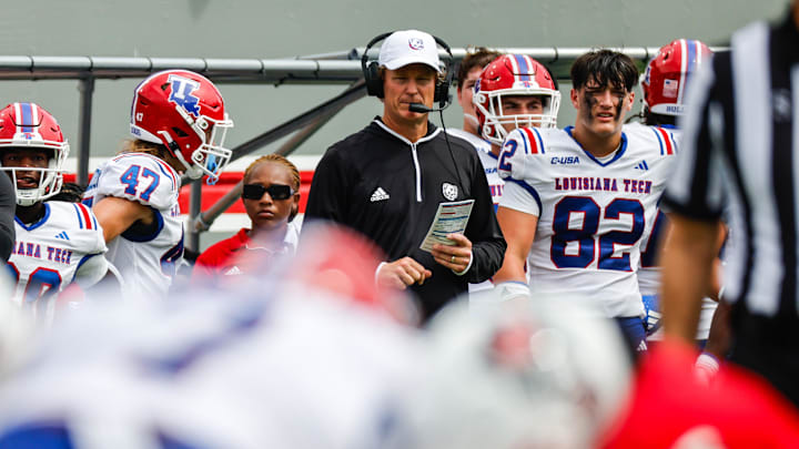 Sep 14, 2024; Raleigh, North Carolina, USA; Louisiana Tech Bulldogs head coach Sonny Cumbie looks on during the second half of the game against North Carolina State Wolfpack at Carter-Finley Stadium. Mandatory Credit: Jaylynn Nash-Imagn Images