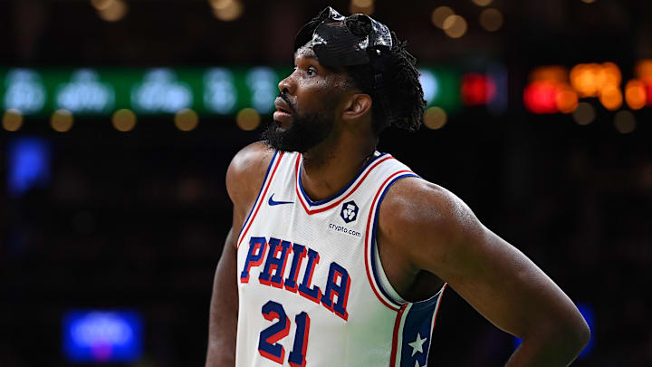 Dec 25, 2024; Boston, Massachusetts, USA; Philadelphia 76ers center Joel Embiid (21) waits during a timeout during the second half against the Boston Celtics at TD Garden. Mandatory Credit: Eric Canha-Imagn Images