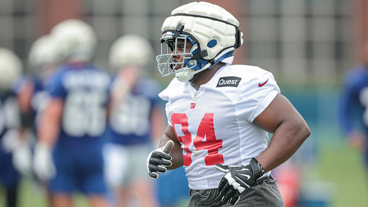 Jul 24, 2024; East Rutherford, NJ, USA; New York Giants defensive tackle Elijah Chatman (94) runs on the field during training camp at Quest Diagnostics Training Facility. Mandatory Credit: Vincent Carchietta-USA TODAY Sports