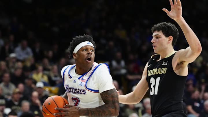 Feb 24, 2025; Boulder, Colorado, USA; Colorado Buffaloes guard Harrison Carrington (31) defends on Kansas Jayhawks guard AJ Storr (2) in the first half at the CU Events Center. Feb 24, 2025; Boulder, Colorado, USA; Colorado Buffaloes guard Harrison Carrington (31) defends on Kansas Jayhawks guard AJ Storr (2) in the first half at the CU Events Center.