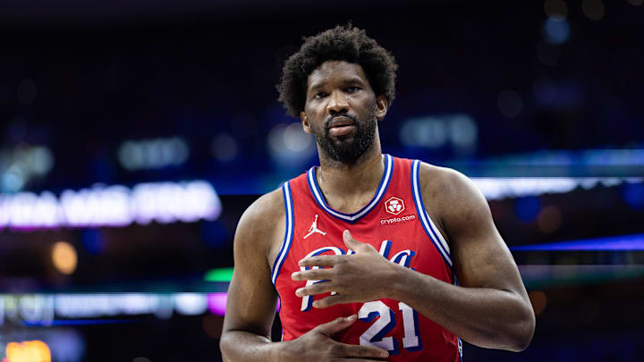 Apr 28, 2024; Philadelphia, Pennsylvania, USA; Philadelphia 76ers center Joel Embiid (21) looks on during the first half against the New York Knicks in game four of the first round in the 2024 NBA playoffs at Wells Fargo Center. Mandatory Credit: Bill Streicher-Imagn Images