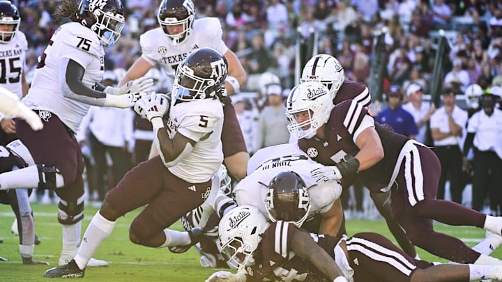 Oct 19, 2024; Starkville, Mississippi, USA; Texas A&M Aggies running back Amari Daniels (5) scores a touchdown against the Mississippi State Bulldogs during the second quarter at Davis Wade Stadium at Scott Field. Mandatory Credit: Matt Bush-Imagn Images Oct 19, 2024; Starkville, Mississippi, USA; Texas A&M Aggies running back Amari Daniels (5) scores a touchdown against the Mississippi State Bulldogs during the second quarter at Davis Wade Stadium at Scott Field. Mandatory Credit: Matt Bush-Imagn Images