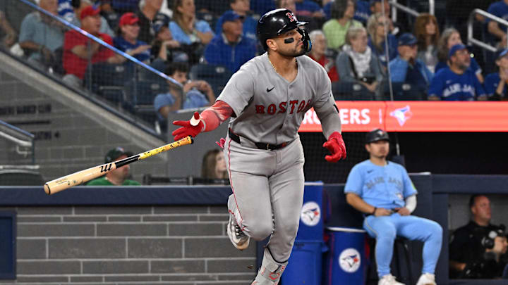 Sep 24, 2025; Toronto, Ontario, CAN;  Boston Red Sox catcher Carlos Narvaez (75) hits a three-run home run against the Toronto Blue Jays in the eighth inning at Rogers Centre. Mandatory Credit: Dan Hamilton-Imagn Images
