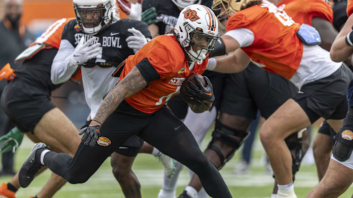 Jan 30, 2025; Mobile, AL, USA; National team running back Ollie Gordon II of Oklahoma State (0) runs through drills during Senior Bowl practice for the National team at Hancock Whitney Stadium. Mandatory Credit: Vasha Hunt-Imagn Images Jan 30, 2025; Mobile, AL, USA; National team running back Ollie Gordon II of Oklahoma State (0) runs through drills during Senior Bowl practice for the National team at Hancock Whitney Stadium. Mandatory Credit: Vasha Hunt-Imagn Images
