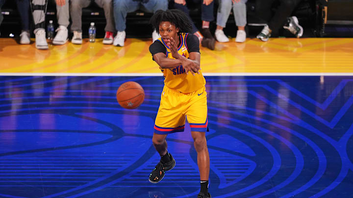 Feb 14, 2025; San Francisco, California, USA; Team M guard Bub Carrington (8) of the Washington Wizards passes the ball during the 2025 NBA Rising Stars Game at Chase Center. Mandatory Credit: Cary Edmondson-Imagn Images