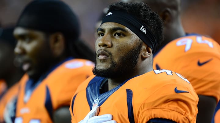 Oct 23, 2014; Denver, CO, USA; Denver Broncos strong safety T.J. Ward (43) during the national anthem before the game against the San Diego Chargers at Sports Authority Field at Mile High. 