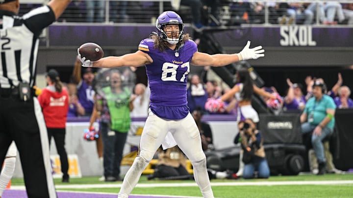 Nov 12, 2023; Minneapolis, Minnesota, USA; Minnesota Vikings tight end T.J. Hockenson (87) reacts after a touchdown against the New Orleans Saints at U.S. Bank Stadium. Mandatory Credit: Jeffrey Becker-Imagn Images