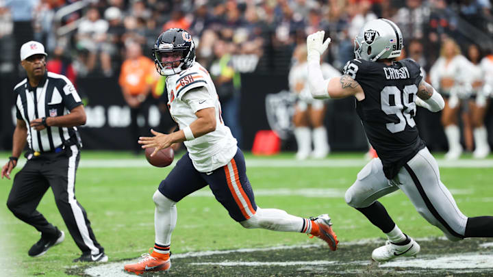 In a scene repeated several times Sunday, Caleb Williams tries to elude Maxx Crosby to pass. In a scene repeated several times Sunday, Caleb Williams tries to elude Maxx Crosby to pass.