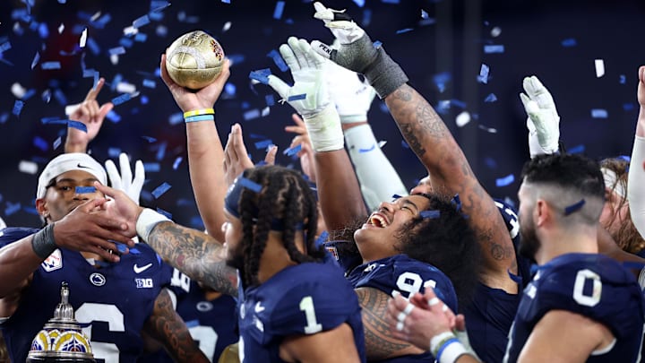 Penn State football players react after the game against the Boise State Broncos in the Fiesta Bowl at State Farm Stadium
